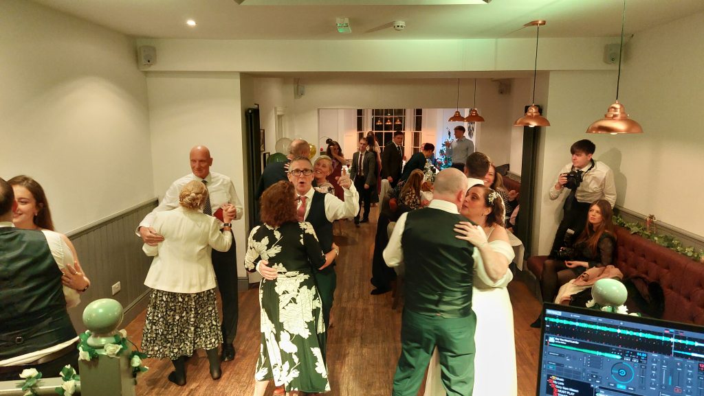 people dancing at a wedding reception